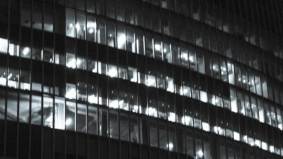 black and white building lit up