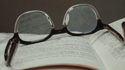 glasses on top of book