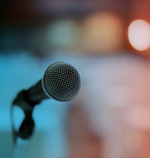 microphone with blurred multicolour background